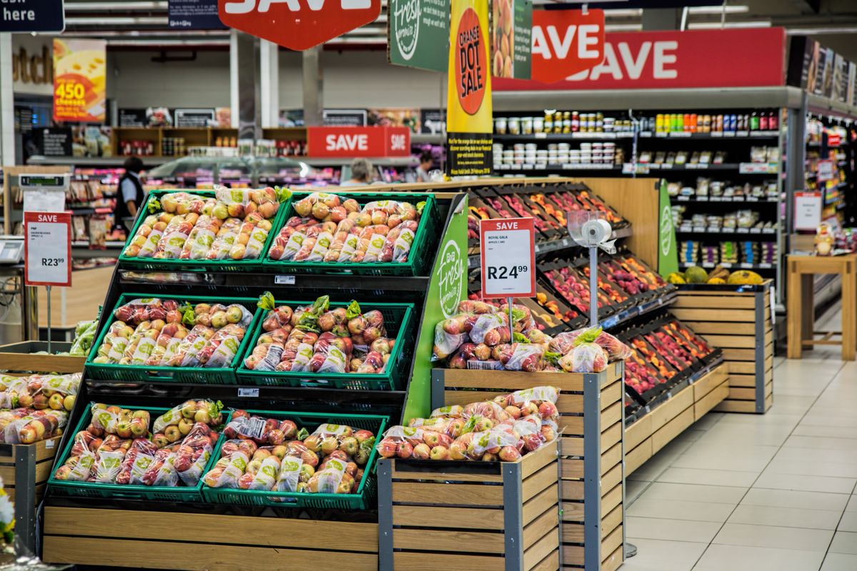 A grocery display with price signs inside a store