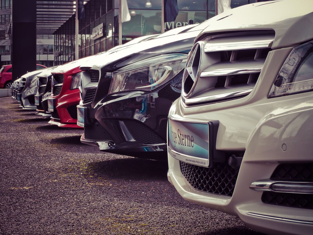 Cars lined up outside a showroom